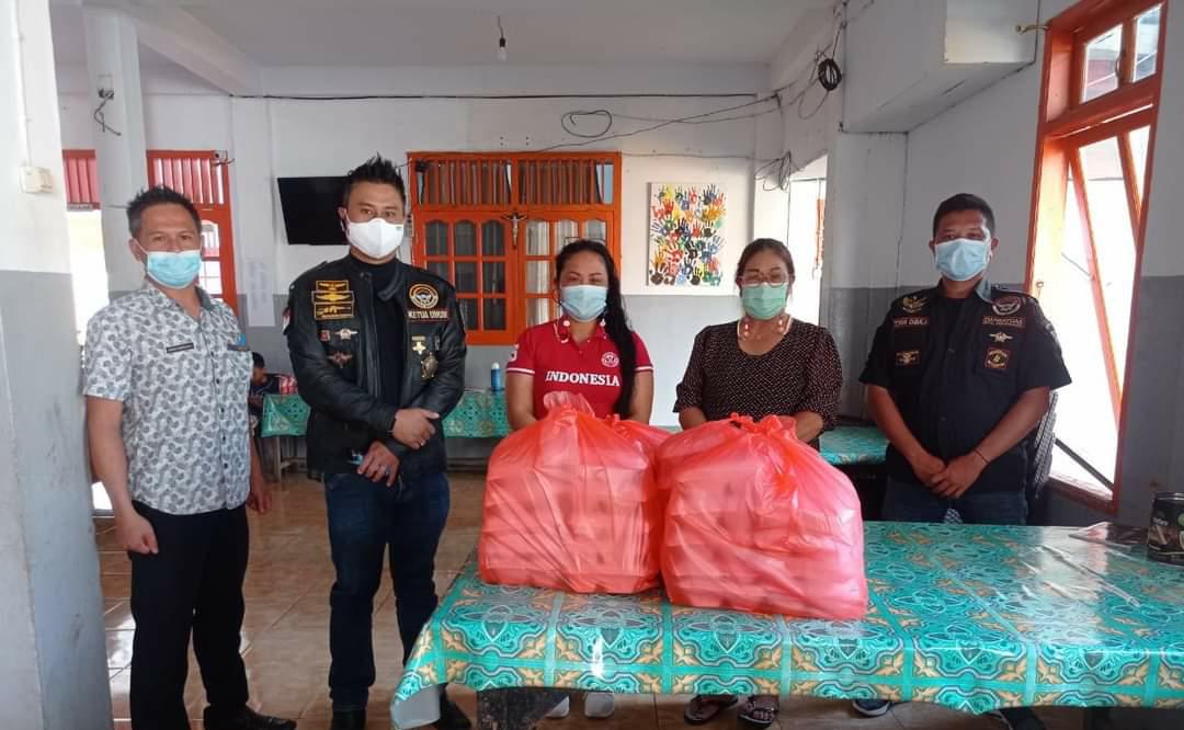Garda Manguni Bersama Gerakan Kamu Hebat dan Kodim Minahasa Berbagi Kasih